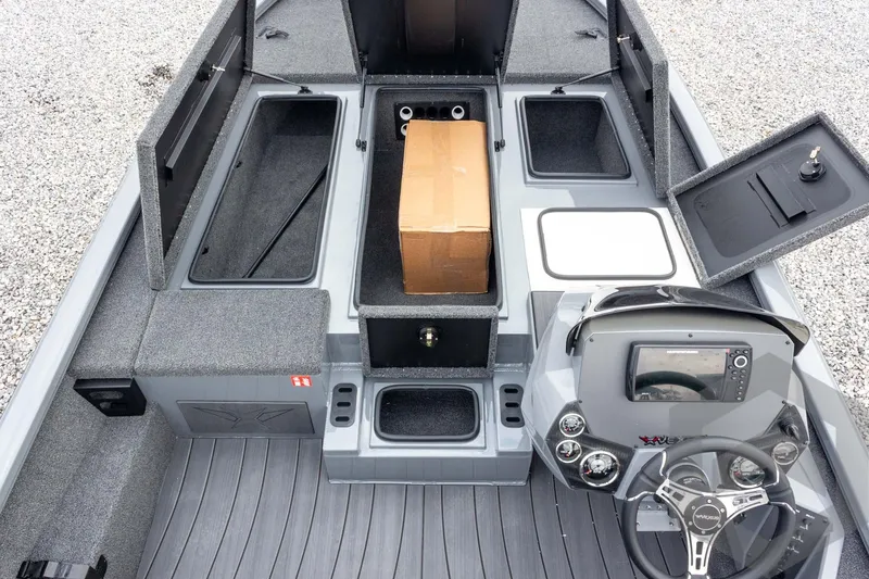 Slide: The Image of 2026 Vexus AVX 1980 boat interior with storage compartments and control panel. - 43
