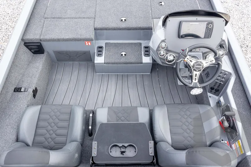 Slide: The Image of 2026 Vexus AVX 1980 boat interior with steering console, seating, and storage compartments. - 51