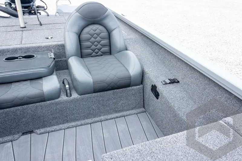 Slide: The Image of 2026 Vexus AVX 1980 boat interior with gray seating and textured flooring. - 52