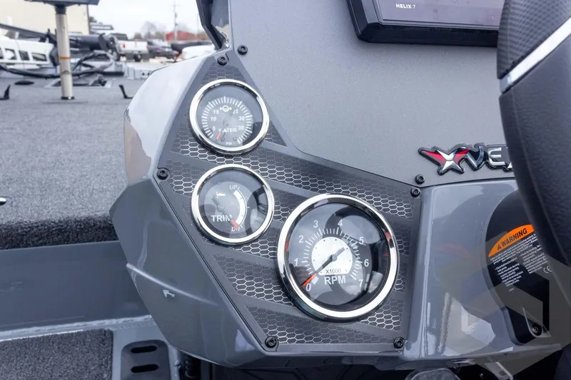 Slide: The Image of 2026 Vexus AVX 1980 boat dashboard with gauges and controls. - 59