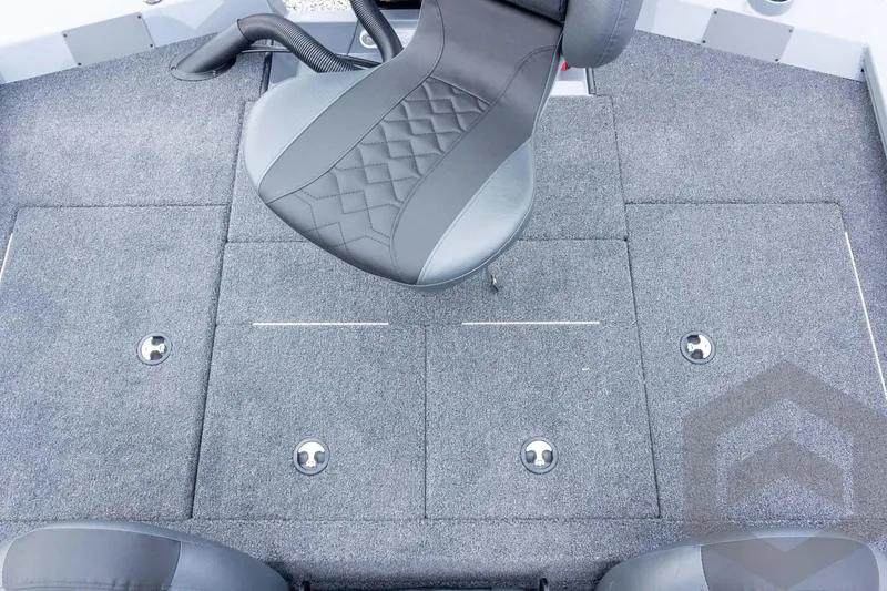 Slide: The Image of 2026 Vexus AVX 1980 boat interior with cushioned seat and carpeted flooring. - 65