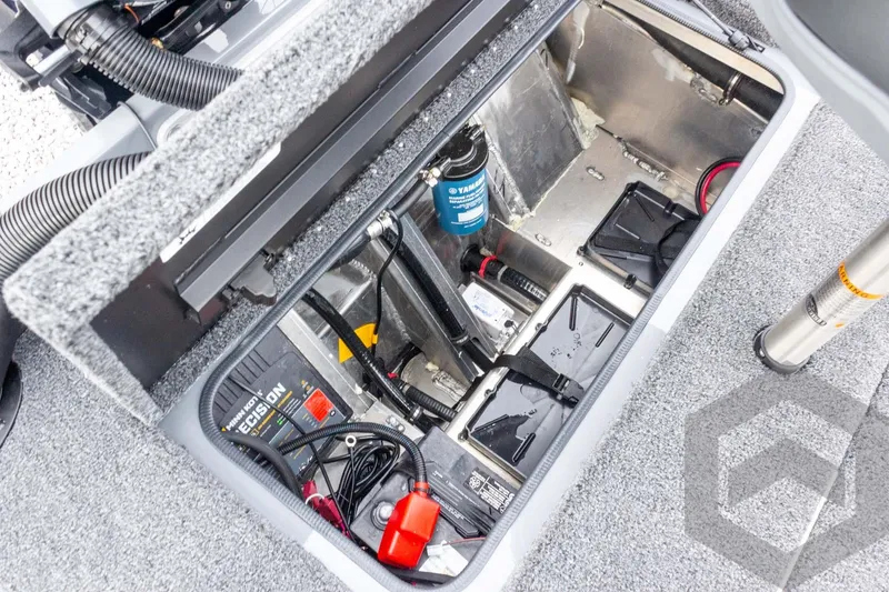 Slide: The Image of 2026 Vexus AVX 1980 boat battery compartment with wiring and components. - 67