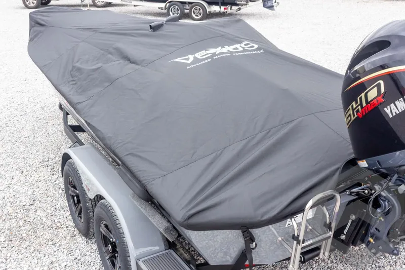 Slide: The Image of 2026 Vexus AVX 1980 boat covered, featuring Yamaha SHO VMAX engine, on a trailer. - 70