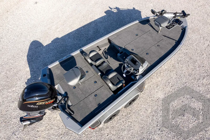 Slide: The Image of 2026 Vexus AVX 1980 boat with Yamaha engine, aerial view on gravel surface. - 82