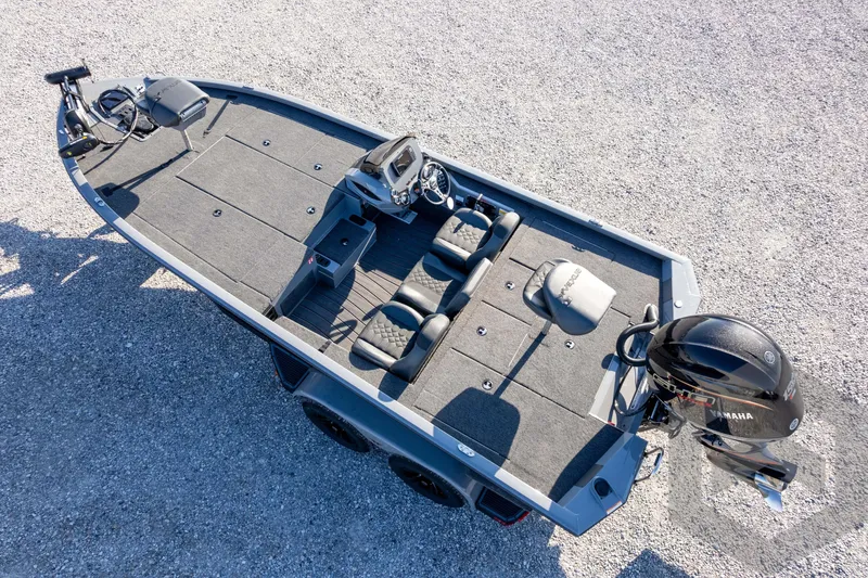 Slide: The Image of 2026 Vexus AVX 1980 boat with Yamaha motor, aerial view on gravel surface. - 84