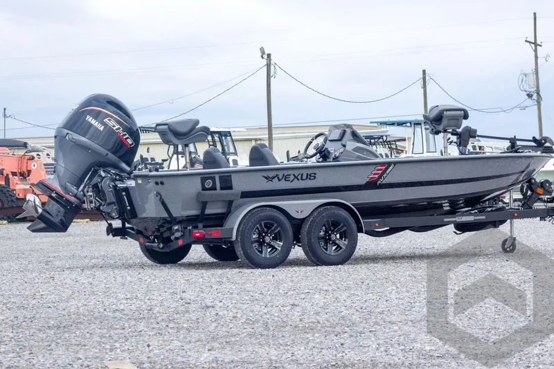 Slide: The Image of 2026 Vexus AVX 1980 boat with Yamaha engine on trailer, parked outdoors. - 9