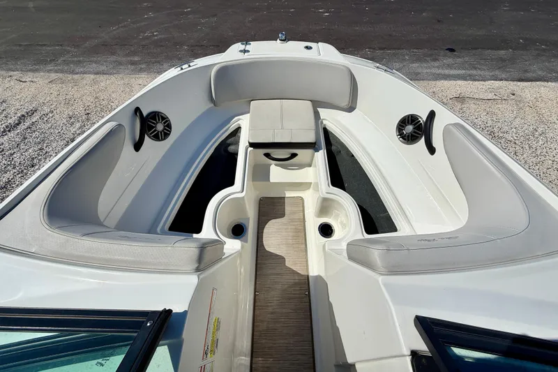 Slide: The Image of 2023 Sea Ray SPX 210 Outboard boat interior with seating and speakers. - 14