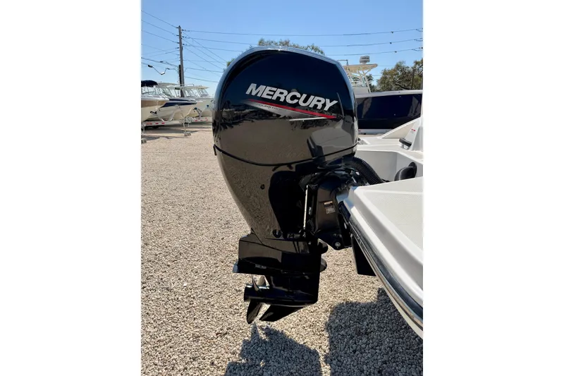 Slide: The Image of 2023 Sea Ray SPX 210 Outboard with Mercury engine in a boatyard. - 28