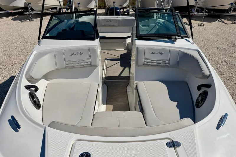 Slide: The Image of 2023 Sea Ray SPX 210 Outboard boat interior with spacious seating and modern design. - 8
