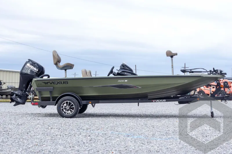 Slide: The Image of 2026 Vexus Defender 181 boat with Suzuki outboard motor on trailer. - 14