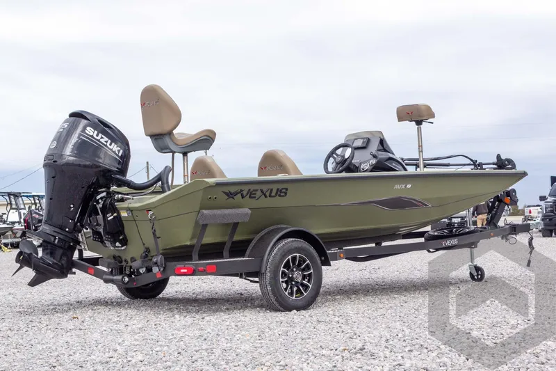 Slide: The Image of 2026 Vexus Defender 181 boat with Suzuki outboard motor on a trailer. - 15
