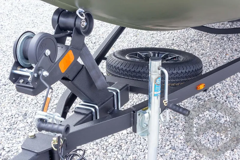 Slide: The Image of Trailer hitch and spare tire of 2026 Vexus Defender 181 on gravel surface. - 20