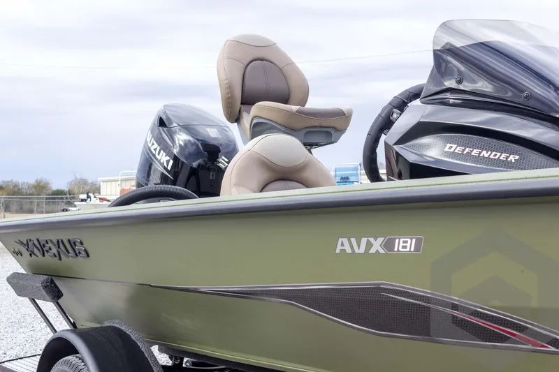 Slide: The Image of 2026 Vexus Defender 181 boat with Suzuki engine, featuring AVX 181 branding. - 22