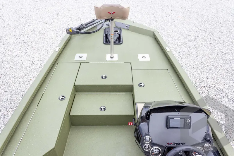 Slide: The Image of 2026 Vexus Defender 181 boat interior with control panel and seating. - 30