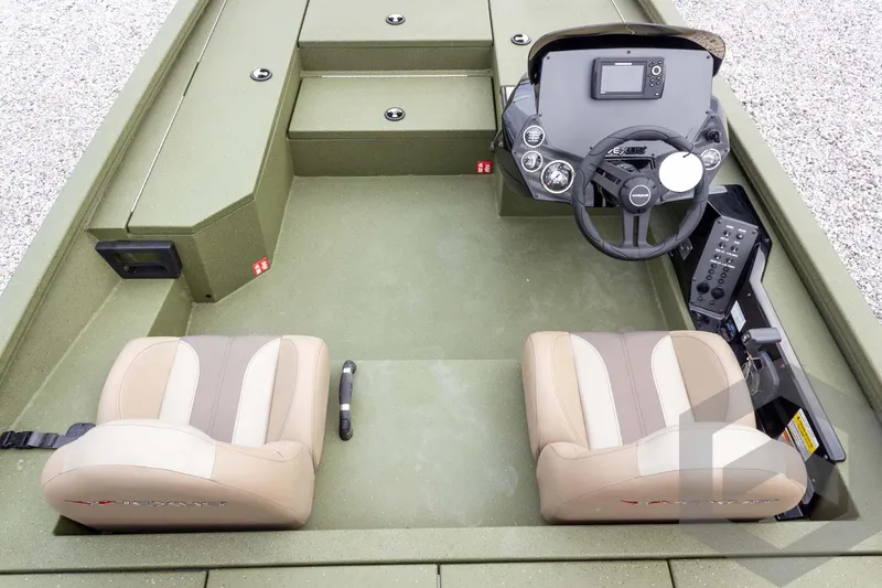 Slide: The Image of 2026 Vexus Defender 181 boat interior with dual seats and modern dashboard controls. - 37