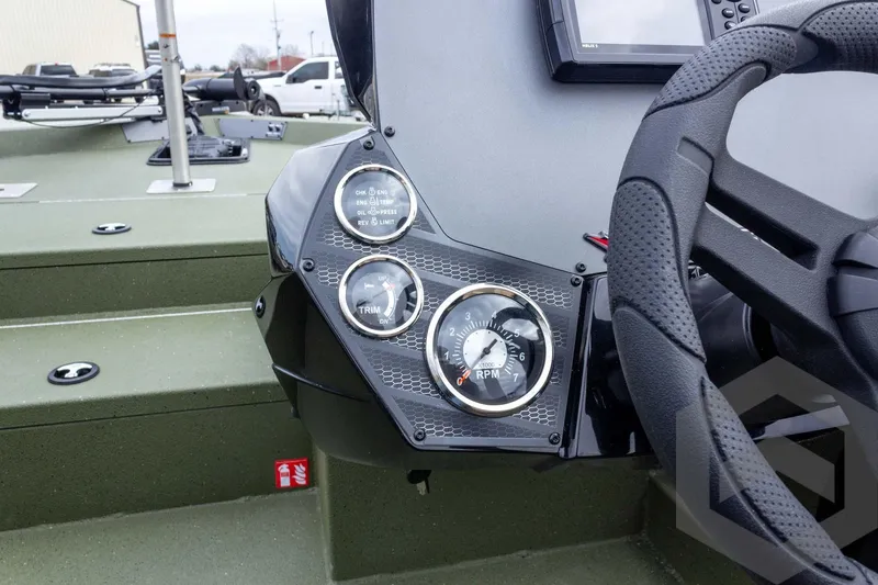 Slide: The Image of 2026 Vexus Defender 181 dashboard with steering wheel and instrument gauges. - 41