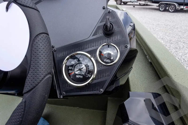 Slide: The Image of Dashboard of 2026 Vexus Defender 181 showing speedometer and fuel gauge. - 42