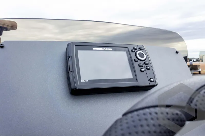 Slide: The Image of 2026 Vexus Defender 181 dashboard with Humminbird Helix 5 fish finder. - 45
