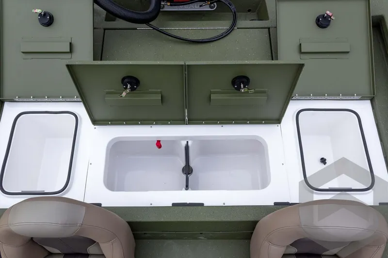 Slide: The Image of 2026 Vexus Defender 181 boat interior with storage compartments and seating. - 48