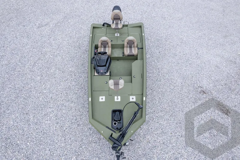 Slide: The Image of 2026 Vexus Defender 181 boat, top view, green with dual seats on gravel surface. - 61