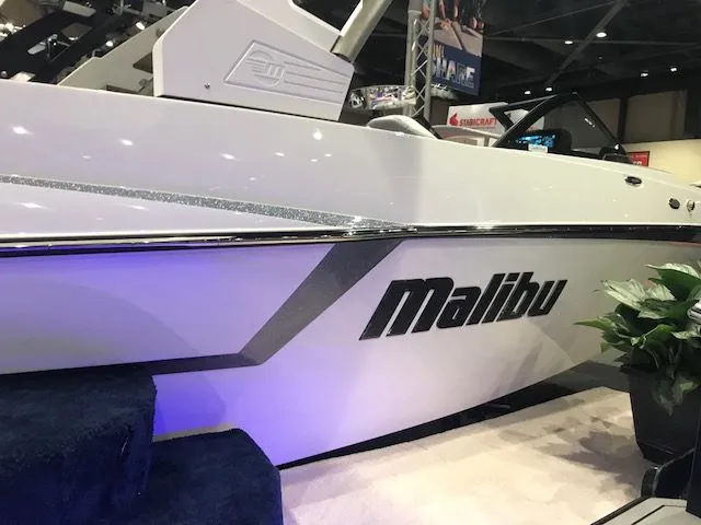 Slide: The Image of Interior of 2018 Malibu Wakesetter 22 MXZ with modern control console. - 12