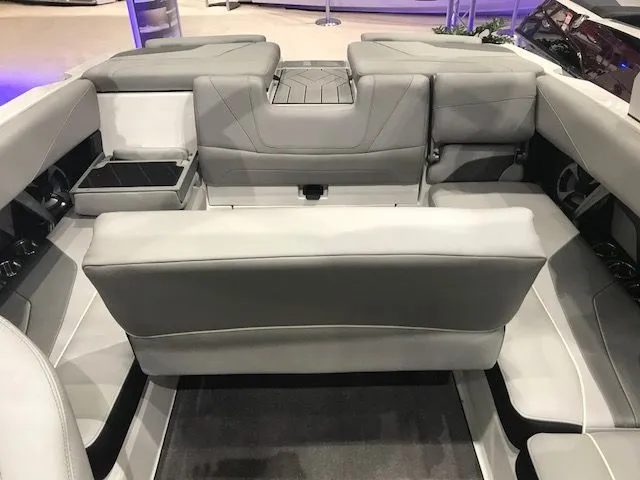 Slide: The Image of Interior of 2018 Malibu Wakesetter 22 MXZ with gray seating. - 6