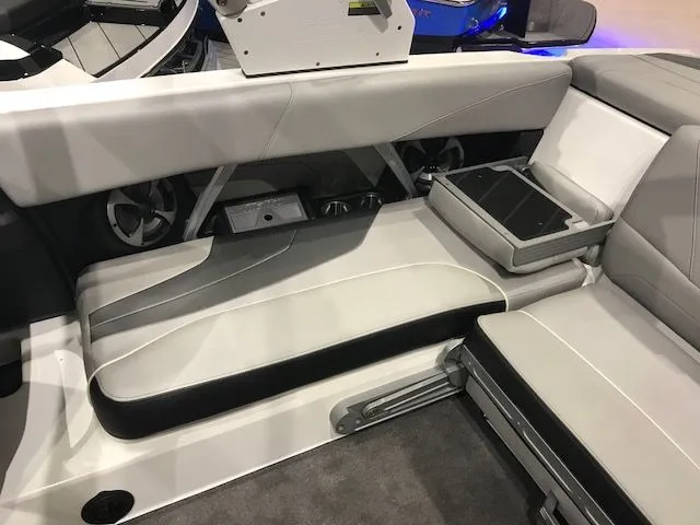 Slide: The Image of 2018 Malibu Wakesetter 22 MXZ boat in a showroom. - 8