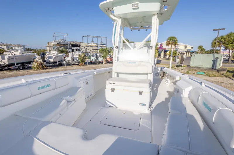 Slide: The Image of 2008 Everglades 243 Center Console boat with spacious seating and modern design. - 19