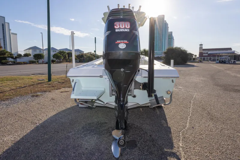 Slide: The Image of 2008 Everglades 243 Center Console boat with Suzuki 300 engine in urban setting. - 23