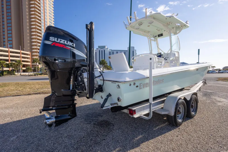 Slide: The Image of 2008 Everglades 243 Center Console boat on trailer with Suzuki outboard motor. - 7