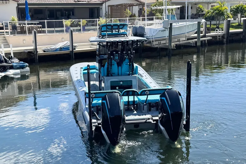 Slide: The Image of 2026 Costa Custom Boats 264 HC docked in a serene waterfront setting. - 3