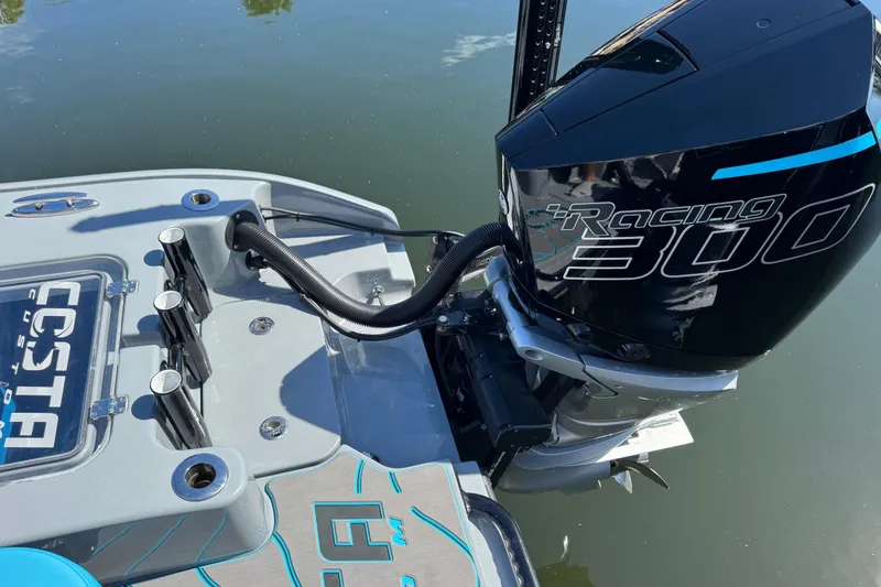 Slide: The Image of 2026 Costa Custom Boats 264 HC with Racing 300 engine on calm water. - 39