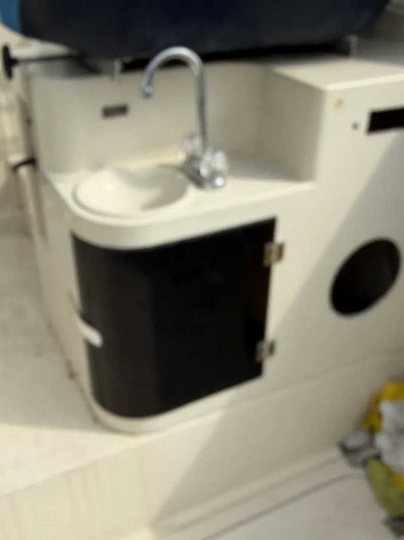 Slide: The Image of Interior of a 1988 Silverton 34X yacht with sink. - 9