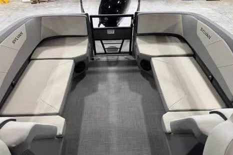 Slide: The Image of 2025 Sylvan A-22 boat interior with spacious seating and modern design. - 8