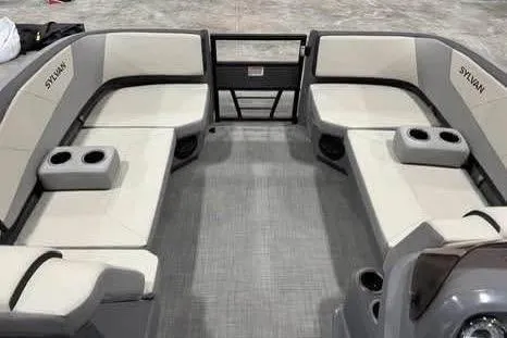 Slide: The Image of 2025 Sylvan A-22 boat interior with spacious seating and cup holders. - 9