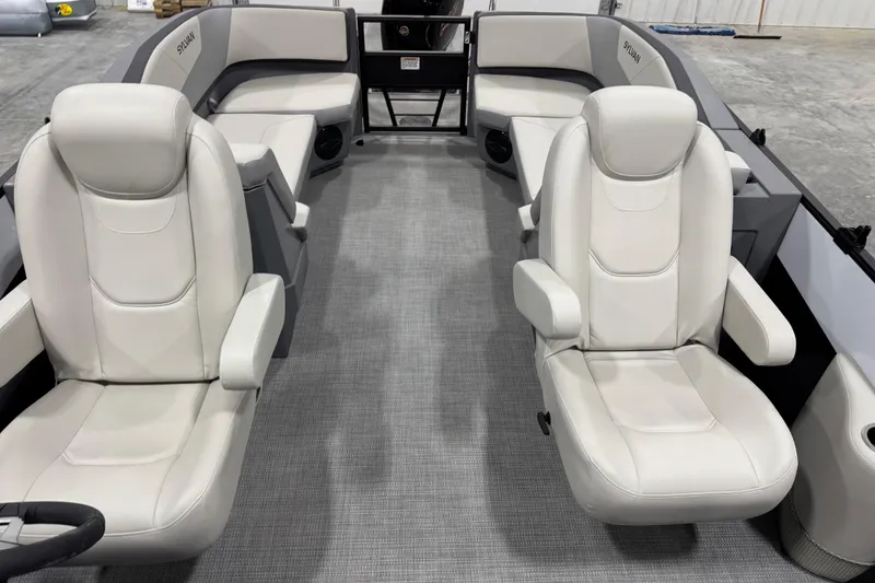 Slide: The Image of Interior of 2025 Sylvan A-22 boat with plush seating and modern design. - 11