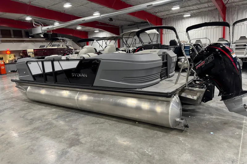 Slide: The Image of 2025 Sylvan A-22 pontoon boat in showroom with Mercury Pro XS engine. - 3