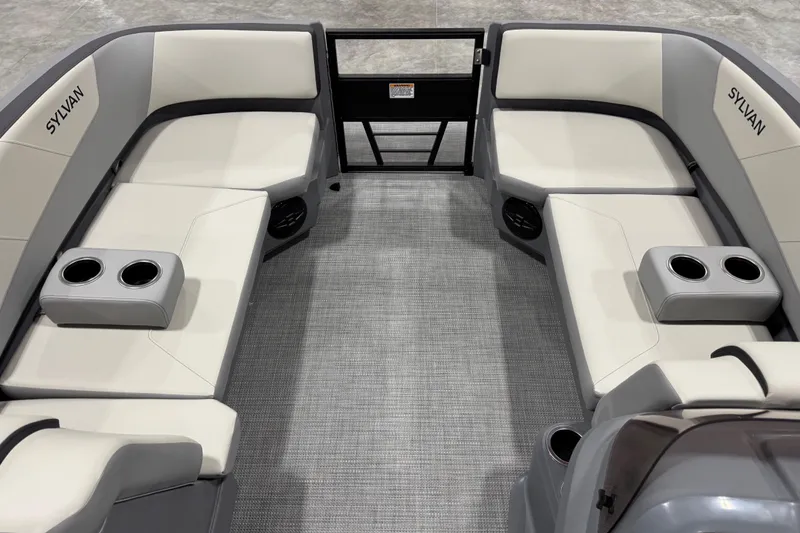 Slide: The Image of 2025 Sylvan A-22 boat interior with gray seating and cup holders. - 8