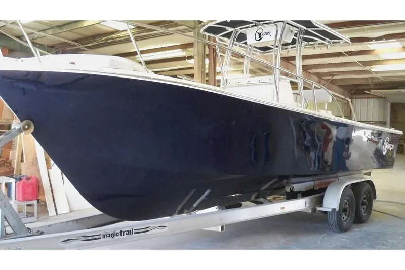 Slide: The Image of Manufacturer Provided Image: 2026 C-Hawk 26 Center Console boat on trailer in warehouse. - 11