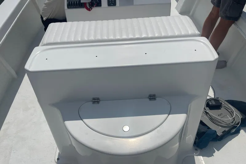 Slide: The Image of 2026 C-Hawk 26 Center Console boat interior with seating and storage compartment. - 5