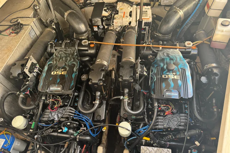 Slide: The Image of Engine compartment of a 2007 Sea Ray Sundancer 310 with twin MerCruiser engines. - 22