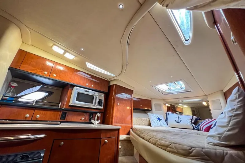 Slide: The Image of Luxurious interior of 2007 Sea Ray Sundancer 310 yacht with cozy cabin and modern amenities. - 53