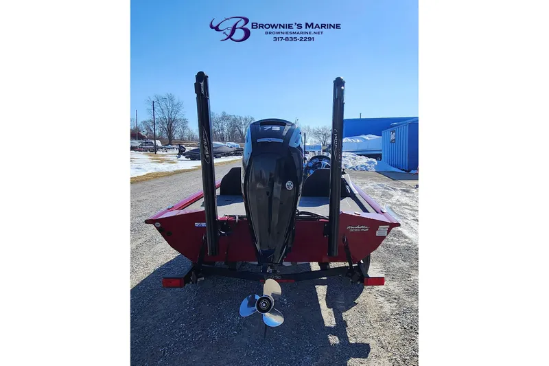 Slide: The Image of 2019 Tracker Pro Team 175 TXW boat with motor, parked outdoors. - 9