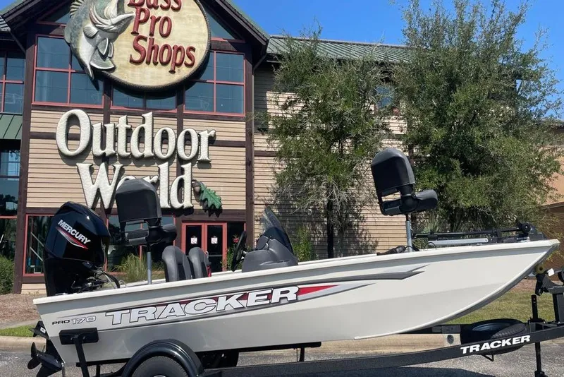 The Image of 2026 Tracker Pro 170 boat displayed outside Bass Pro Shops Outdoor World. - 0