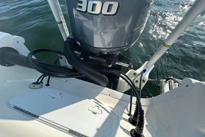 Slide: The Image of 2020 Sea Pro 248 Bay boat with 300 horsepower engine on water. - 14