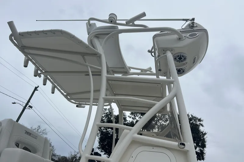 Slide: The Image of 2025 Pathfinder 2700 Open boat tower with speakers and canopy, viewed from below. - 2