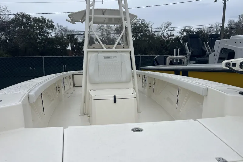 Slide: The Image of 2025 Pathfinder 2700 Open boat interior with seating and storage compartments. - 4