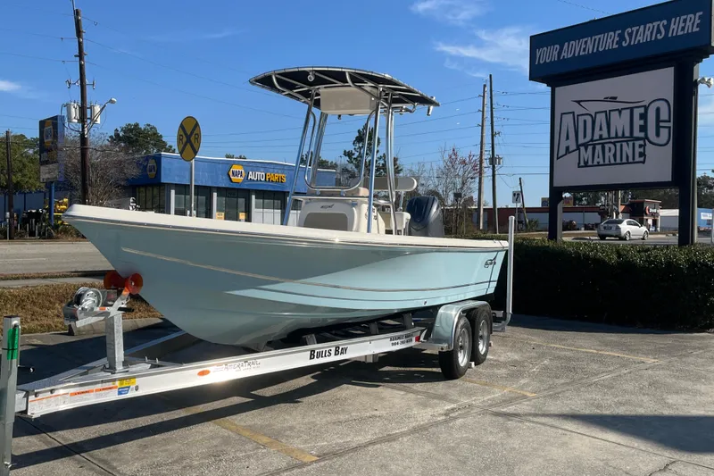 Slide: The Image of 2026 Bulls Bay 2200 boat on trailer at Adamec Marine dealership. - 1
