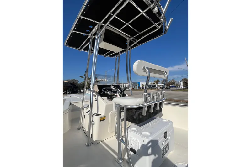 Slide: The Image of 2026 Bulls Bay 2200 boat interior with T-top and seating, showcasing modern design. - 12