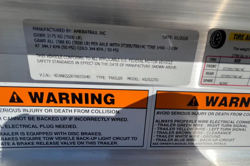 Slide: The Image of Warning labels and specifications on a 2026 Bulls Bay 2200 trailer. - 22